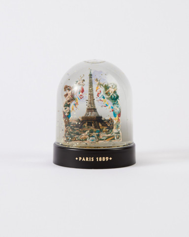 Vintage snow globe with the Eiffel Tower from the 1889 World's Fair